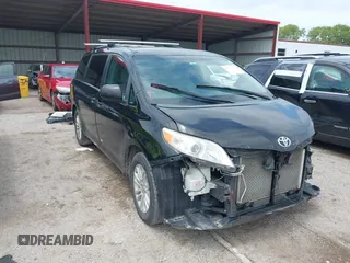 2015 Toyota Sienna LE AAS with VIN 5TDKK3DC7FS555199, listed as a IAAI auction lot 42728757 with 122,989 mi miles and . Bid and sale history available at DreamBid. Image 1.