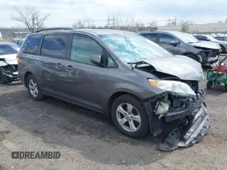 2014 Toyota Sienna LE AAS with VIN 5TDKK3DC1ES462368, listed as a IAAI auction lot 41877913 with 158,846 mi miles. Bid and sale history available at carsss.com. Image 1.