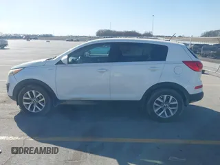 2015 Kia Sportage LX with VIN KNDPBCAC8F7690843, listed as a IAAI auction lot 41813154 with 124,885 mi miles and . Bid and sale history available at carsss.com. Image 14.