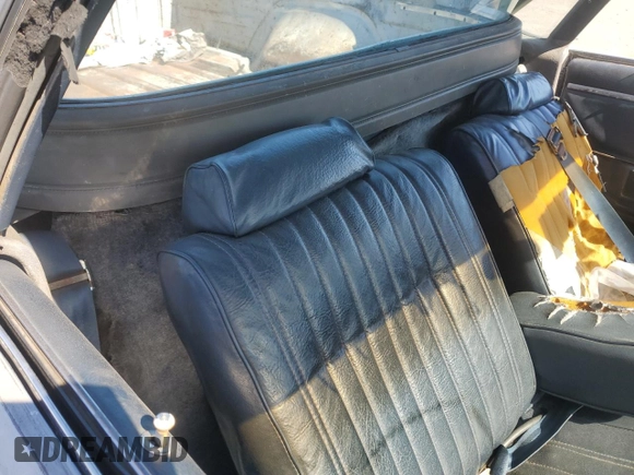 1982 Chevrolet El Camino z VIN 1GCCW80K1CR129344, wystawiony jako Copart lot #77126034 z przebiegiem 295 869 mil mil oraz Szkoda całkowita • Salvage title. Historia ofert i sprzedaży dostępna na DreamBid. Obrazek 10.