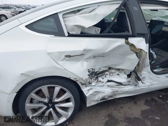 2018 Tesla Model 3 Long Range Battery with VIN 5YJ3E1EB2JF089006, listed as a IAAI auction lot 41186372 with Not Provided miles and . Bid and sale history available at DreamBid. Image 6.
