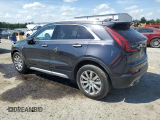 2023 Cadillac XT4 FWD Premium Luxury с VIN 1GYFZCR42PF100724, выставлен на аукционе Copart как лот 55130305 с пробегом 68 258 миль миль и Списание • Salvage title. История ставок и продаж доступна на DreamBid. Изображение 2.