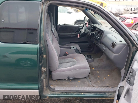 1998 Dodge Dakota SLT with VIN 1B7GL22Y8WS722611, listed as a IAAI auction lot 40964684 with 213,429 mi miles and . Bid and sale history available at DreamBid. Image 5.