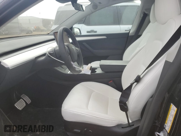 2022 Tesla Model Y Performance with VIN 7SAYGDEF3NF546385, listed as a Copart auction lot 83784984 with 30,769 mi miles and Salvage Title. Bid and sale history available at DreamBid. Image 7.
