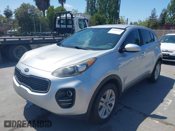 2017 Kia Sportage LX with VIN KNDPMCAC8H7130334, listed as a IAAI auction lot 42184166 with 128,364 mi miles and . Bid and sale history available at carsss.com. Image 6.