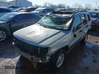 2001 Jeep Grand Cherokee Laredo with VIN 1J4GX48S51C735316, listed as a IAAI auction lot 41752349 with 214,101 mi miles and . Bid and sale history available at DreamBid. Image 6.