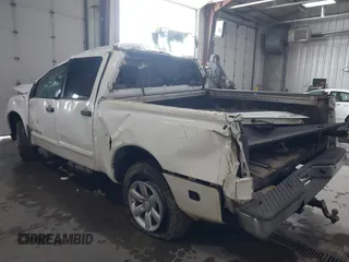 2013 Nissan Titan Pro-4X with VIN 1N6BA0EC7DN311469, listed as a IAAI auction lot 41945284 with 88,225 mi miles and . Bid and sale history available at DreamBid. Image 3.