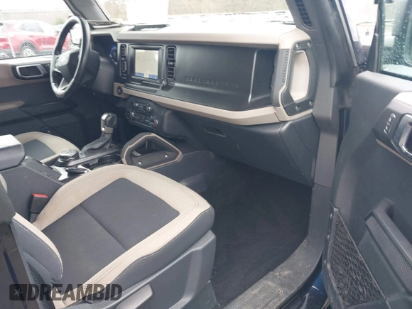 2021 Ford Bronco with VIN 1FMDE5BH8MLA83132, listed as a IAAI auction lot 41729825 with 31,192 mi miles and . Bid and sale history available at DreamBid. Image 5.