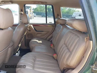 1999 Jeep Grand Cherokee Limited z VIN 1J4GW68N5XC630910, wystawiony jako IAAI lot #42380978 z przebiegiem 188 300 mil mil oraz . Historia ofert i sprzedaży dostępna na DreamBid. Obrazek 8.