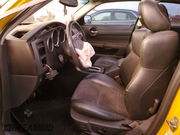 2007 Dodge Charger SRT-8 with VIN 2B3KA73W97H662391, listed as a Copart auction lot 82000474 with 141,721 mi miles and Salvage Title. Bid and sale history available at DreamBid. Image 7.