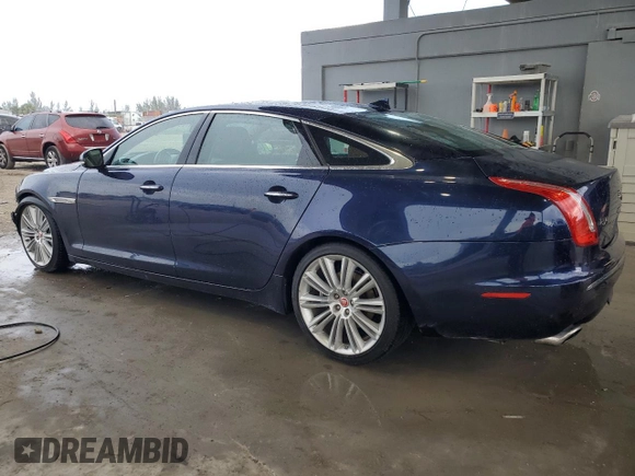 2015 Jaguar XJ Portfolio with VIN SAJWJ2GD2F8V90287, listed as a Copart auction lot 50291095 with 46,917 mi miles and Salvage title. Bid and sale history available at DreamBid. Image 2.