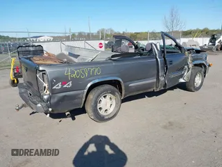 1999 GMC Sierra 1500 SLE with VIN 1GTEK14T1XE547270, listed as a IAAI auction lot 42059770 with 307,097 mi miles and . Bid and sale history available at DreamBid. Image 4.