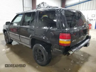1995 Jeep Grand Cherokee Laredo with VIN 1J4GZ58Y5SC565187, listed as a Copart auction lot 45179985 with 122,863 mi miles and Salvage Title. Bid and sale history available at carsss.com. Image 2.
