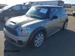 2007 MINI Hardtop S with VIN WMWMF73567TL91385, listed as a IAAI auction lot 41866865 with 114,778 mi miles and . Bid and sale history available at DreamBid. Image 17.