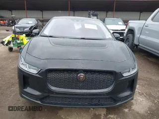 2020 Jaguar I-Pace SE with VIN SADHC2S14L1F80256, listed as a IAAI auction lot 42055674 with 48,694 mi miles and . Bid and sale history available at DreamBid. Image 12.