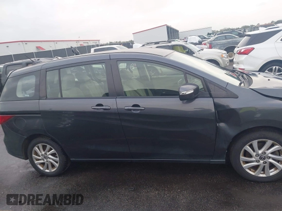 2015 Mazda 5 Sport with VIN JM1CW2BL3F0188052, listed as a IAAI auction lot 40777036 with 69,405 mi miles. Bid and sale history available at carsss.com. Image 13.