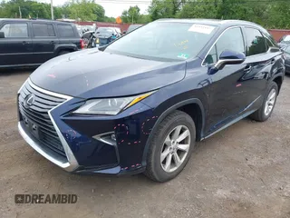 2016 Lexus RX 350 with VIN 2T2BZMCA6GC010568, listed as a IAAI auction lot 42352197 with 72,146 mi miles and . Bid and sale history available at DreamBid. Image 2.