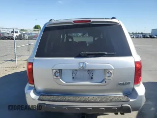 2005 Honda Pilot EX-L z VIN 2HKYF18635H569581, wystawiony jako Copart lot #57295595 z przebiegiem 209 697 mil mil oraz Szkoda całkowita • Salvage title. Historia ofert i sprzedaży dostępna na DreamBid. Obrazek 6.