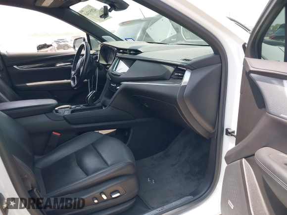 2021 Cadillac XT5 FWD Premium Luxury z VIN 1GYKNCR42MZ174309, wystawiony jako IAAI lot #42051341 z przebiegiem 75 544 mil mil oraz . Historia ofert i sprzedaży dostępna na DreamBid. Obrazek 5.
