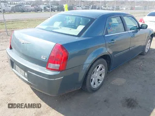 2005 Chrysler 300 with VIN 2C3JA53G35H157178, listed as a IAAI auction lot 41849007 with 149,247 mi miles. Bid and sale history available at carsss.com. Image 4.