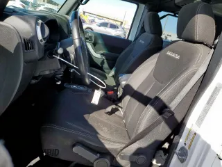 2017 Jeep Wrangler Unlimited Sahara with VIN 1C4BJWEG3HL665774, listed as a Copart auction lot 48538105 with 98,676 mi miles and Salvage Title. Bid and sale history available at carsss.com. Image 7.