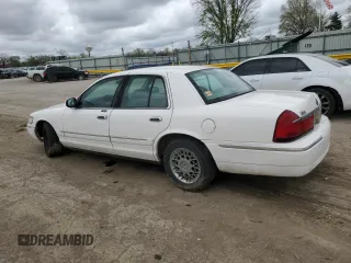 1999 Mercury Grand Marquis GS z VIN 2MEFM74W0XX670924, wystawiony jako Copart lot #51811055 z przebiegiem 176 559 mil mil oraz Szkoda całkowita • Salvage title. Historia ofert i sprzedaży dostępna na DreamBid. Obrazek 2.