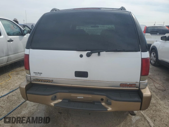 2000 GMC Jimmy SL with VIN 1GKCS13W4Y2106047, listed as a Copart auction lot 75257184 with 73,571 mi miles and Non Repairable. Bid and sale history available at carsss.com. Image 6.