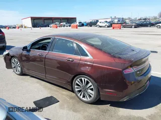 2019 Lincoln MKZ Reserve II z VIN 3LN6L5E99KR623668, wystawiony jako IAAI lot #41822730 z przebiegiem 13 609 mil mil oraz . Historia ofert i sprzedaży dostępna na DreamBid. Obrazek 14.