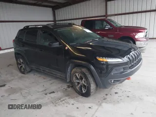 2014 Jeep Cherokee Trailhawk with VIN 1C4PJMBS3EW150366, listed as a IAAI auction lot 41971035 with 90,994 mi miles. Bid and sale history available at carsss.com. Image 12.