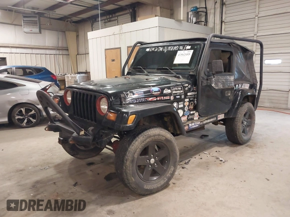 1999 Jeep Wrangler Sahara z VIN 1J4FY49S4XP432567, wystawiony jako IAAI lot #41562455 z przebiegiem Nie podano mil oraz . Historia ofert i sprzedaży dostępna na DreamBid. Obrazek 2.
