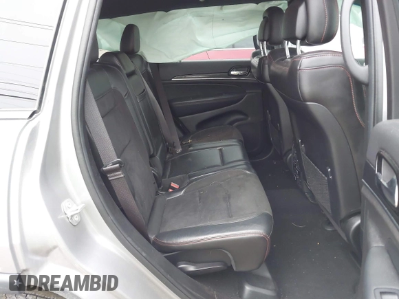 2021 Jeep Grand Cherokee Trailhawk with VIN 1C4RJFLG2MC579884, listed as a IAAI auction lot 41526769 with 115,461 mi miles. Bid and sale history available at carsss.com. Image 8.