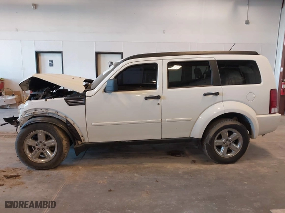 2008 Dodge Nitro SXT with VIN 1D8GU28K48W272971, listed as a IAAI auction lot 41774435 with 225,071 mi miles. Bid and sale history available at carsss.com. Image 14.