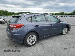 2017 Subaru Impreza Premium with VIN 4S3GTAD61H3711128, listed as a Copart auction lot 58942425 with 127,890 mi miles and Salvage title. Bid and sale history available at DreamBid. Image 3.