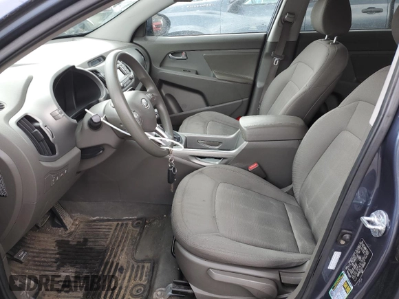 2012 Kia Sportage LX with VIN KNDPBCA25C7285039, listed as a Copart auction lot 52620735 with 197,305 mi miles and Salvage title. Bid and sale history available at DreamBid. Image 7.