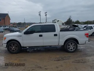 2014 Ford F-150 XL with VIN 1FTFW1CF8EFA66332, listed as a IAAI auction lot 41033667 with 200,513 mi miles. Bid and sale history available at carsss.com. Image 14.
