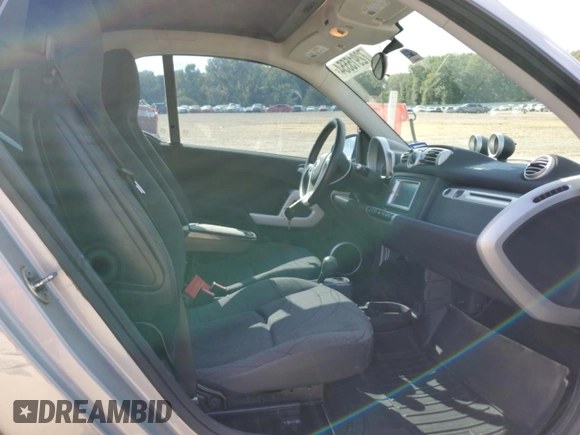2011 Smart fortwo Pure with VIN WMEEJ3BA8BK429292, listed as a Copart auction lot 72915554 with 126,673 mi miles and Salvage title. Bid and sale history available at DreamBid. Image 10.