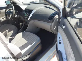 2012 Hyundai Accent GS with VIN KMHCT5AEXCU051493, listed as a IAAI auction lot 41666634 with 176,293 mi miles. Bid and sale history available at carsss.com. Image 5.