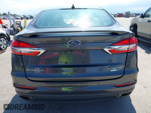 2019 Ford Fusion Titanium with VIN 3FA6P0D91KR104827, listed as a IAAI auction lot 42221526 with 141,316 mi miles and . Bid and sale history available at DreamBid. Image 16.