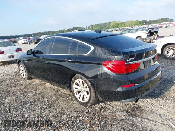 2013 BMW 5 Series GT 535i xDrive with VIN WBASP2C50DC338989, listed as a IAAI auction lot 42041585 with 121,429 mi miles. Bid and sale history available at carsss.com. Image 3.
