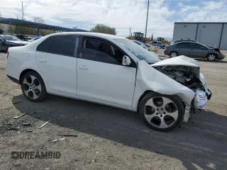 2009 Volkswagen Jetta S with VIN 3VWJZ71K99M059879, listed as a Copart auction lot 47478145 with 154,359 mi miles and Salvage title. Bid and sale history available at DreamBid. Image 4.