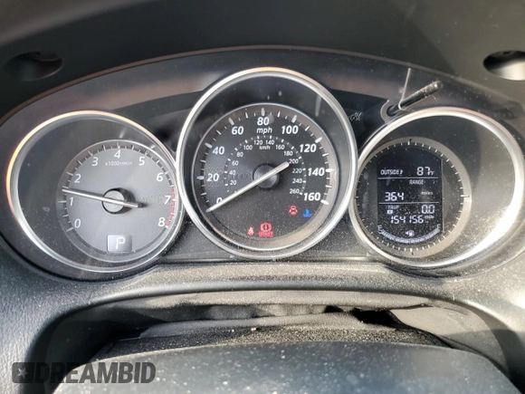 2015 Mazda CX-5 Sport with VIN JM3KE4BE7F0449623, listed as a Copart auction lot 78989944 with 154,156 mi miles and Salvage title. Bid and sale history available at DreamBid. Image 9.