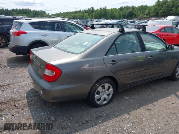 2002 Toyota Camry LE z VIN JTDBE32KX20070778, wystawiony jako IAAI lot #42389584 z przebiegiem 278 070 mil mil oraz . Historia ofert i sprzedaży dostępna na DreamBid. Obrazek 4.
