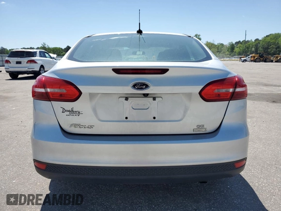 2018 Ford Focus SE with VIN 1FADP3FE0JL202442, listed as a Copart auction lot 53468725 with 106,119 mi miles and Salvage title. Bid and sale history available at DreamBid. Image 6.