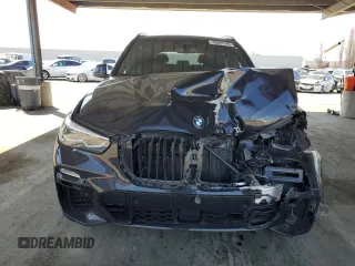 2020 BMW X5 xDrive40i with VIN 5UXCR6C02L9C72472, listed as a Copart auction lot 48023145 with 59,200 mi miles and Salvage title. Bid and sale history available at DreamBid. Image 5.