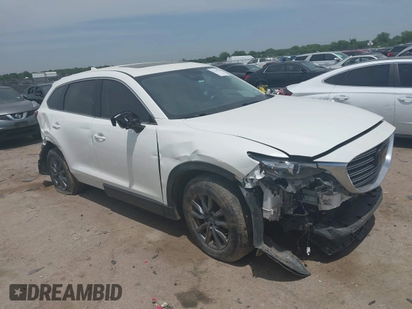2021 Mazda CX-9 Touring with VIN JM3TCACY9M0526376, listed as a IAAI auction lot 42264478 with 74,671 mi miles and . Bid and sale history available at DreamBid. Image 1.