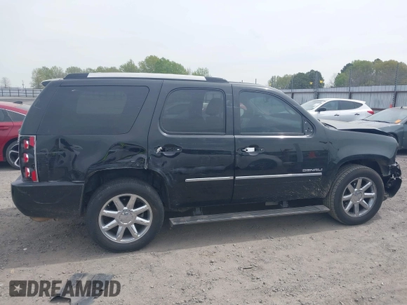 2014 GMC Yukon Denali z VIN 1GKS1EEFXER113493, wystawiony jako IAAI lot #41742662 z przebiegiem 150 382 mil mil oraz . Historia ofert i sprzedaży dostępna na DreamBid. Obrazek 13.