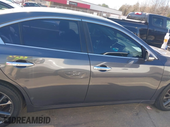 2012 Nissan Maxima S with VIN 1N4AA5APXCC821884, listed as a IAAI auction lot 41640474 with 185,732 mi miles and . Bid and sale history available at DreamBid. Image 14.