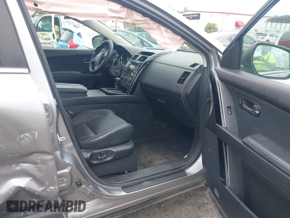 2015 Mazda CX-9 Touring z VIN JM3TB2CA1F0455916, wystawiony jako IAAI lot #42226924 z przebiegiem 157 643 mil mil oraz . Historia ofert i sprzedaży dostępna na DreamBid. Obrazek 5.