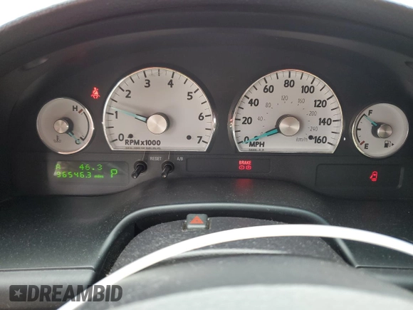 2005 Ford Thunderbird Deluxe z VIN 1FAHP60A05Y105999, wystawiony jako Copart lot #41981235 z przebiegiem 96 546 mil mil oraz Szkoda całkowita • Salvage title. Historia ofert i sprzedaży dostępna na DreamBid. Obrazek 9.