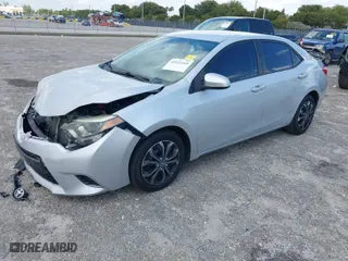 2015 Toyota Corolla L with VIN 2T1BURHE0FC431728, listed as a IAAI auction lot 41932169 with 121,355 mi miles. Bid and sale history available at carsss.com. Image 2.